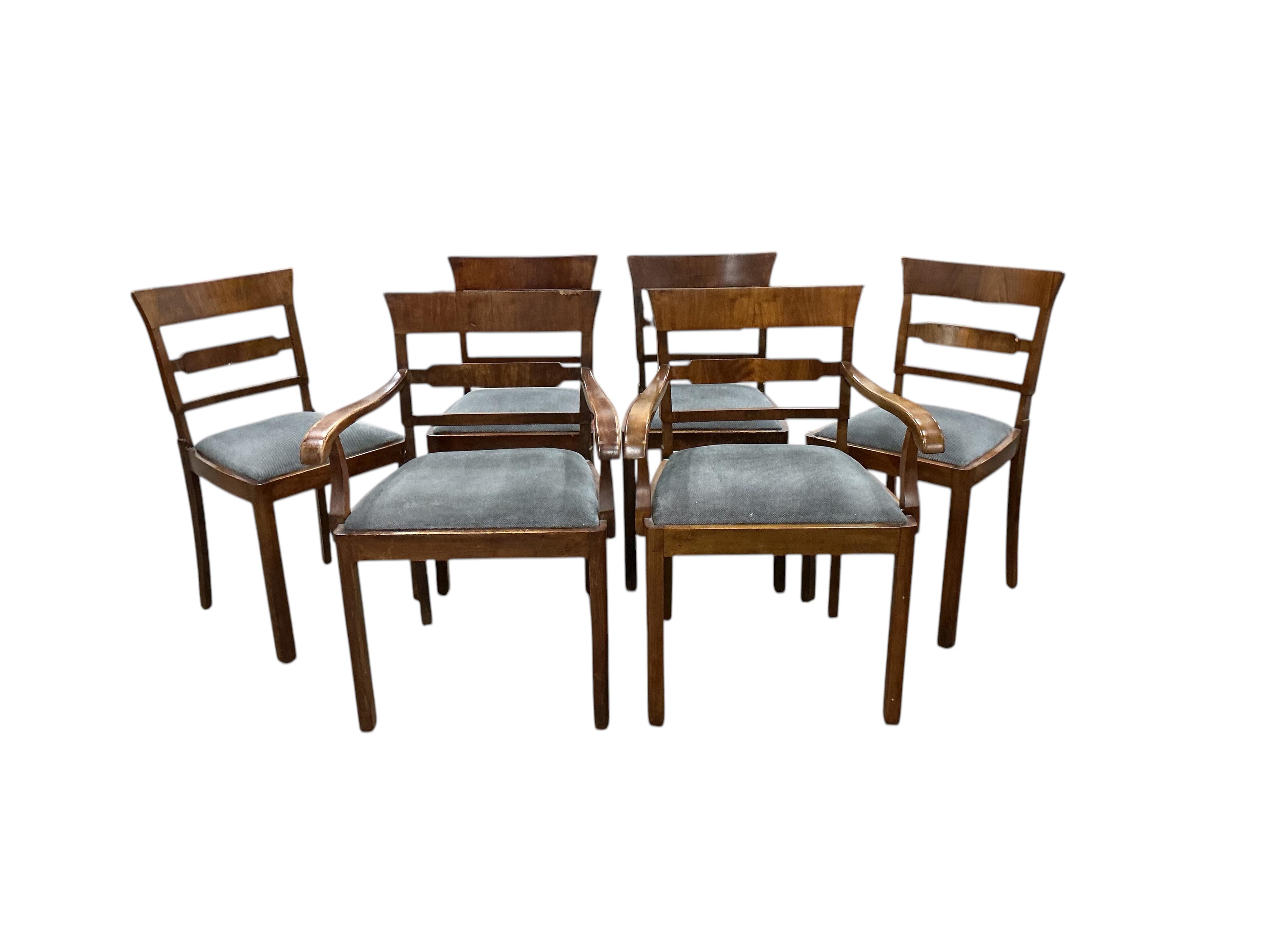 An Art Deco style beech and birds eye maple extending dining table, width 110cm, depth 84cm, height 75cm, and six similar chairs, two with arms